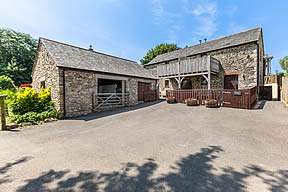 Groom's and Keeper's Cottages with adjacent barn